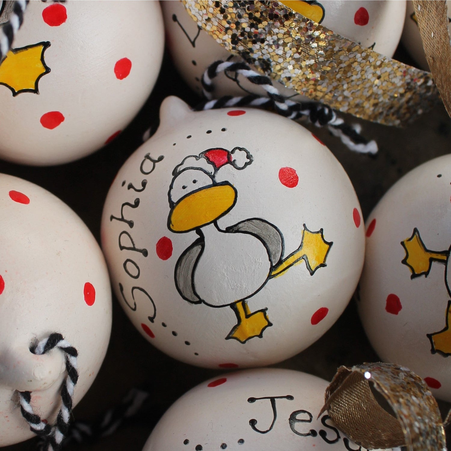 Personalised bauble seagull in a Christmas hat by Laura Lee Designs