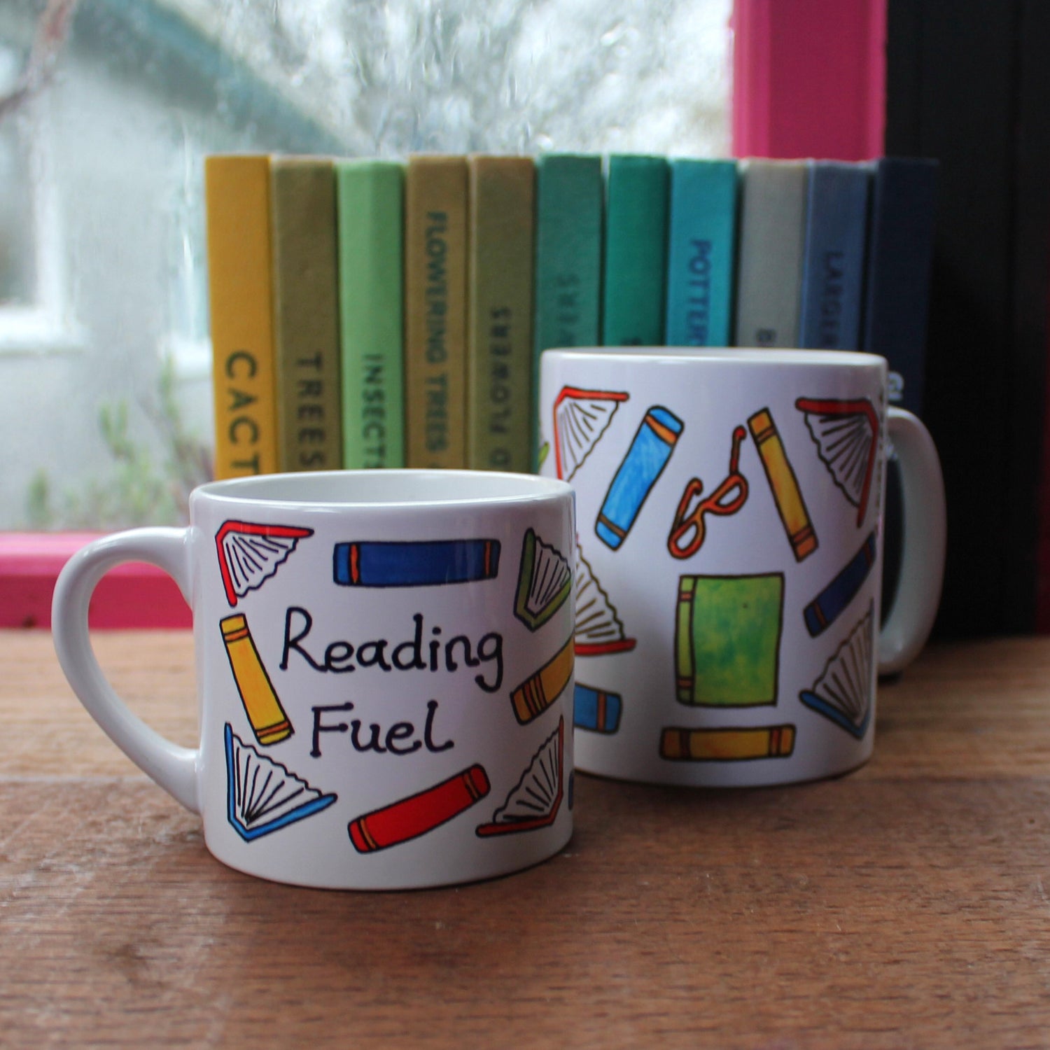 Reading fuel reader mug cup covered in books by Laura Lee Designs