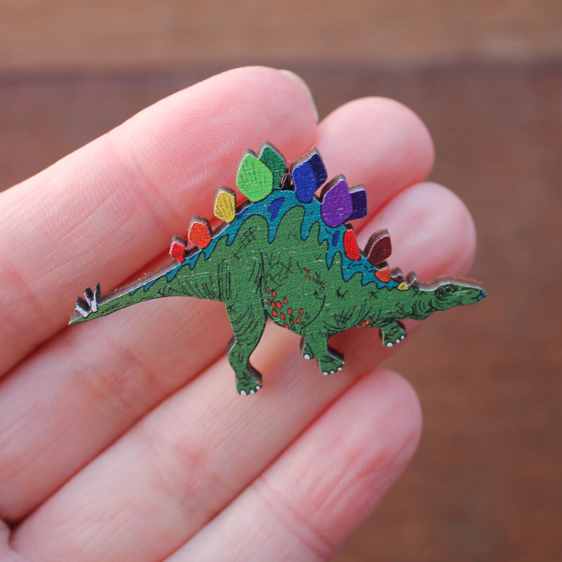 Rainbow stegosaurus brooch fun dinosaur brooch by Laura Lee Designs Cornwall 